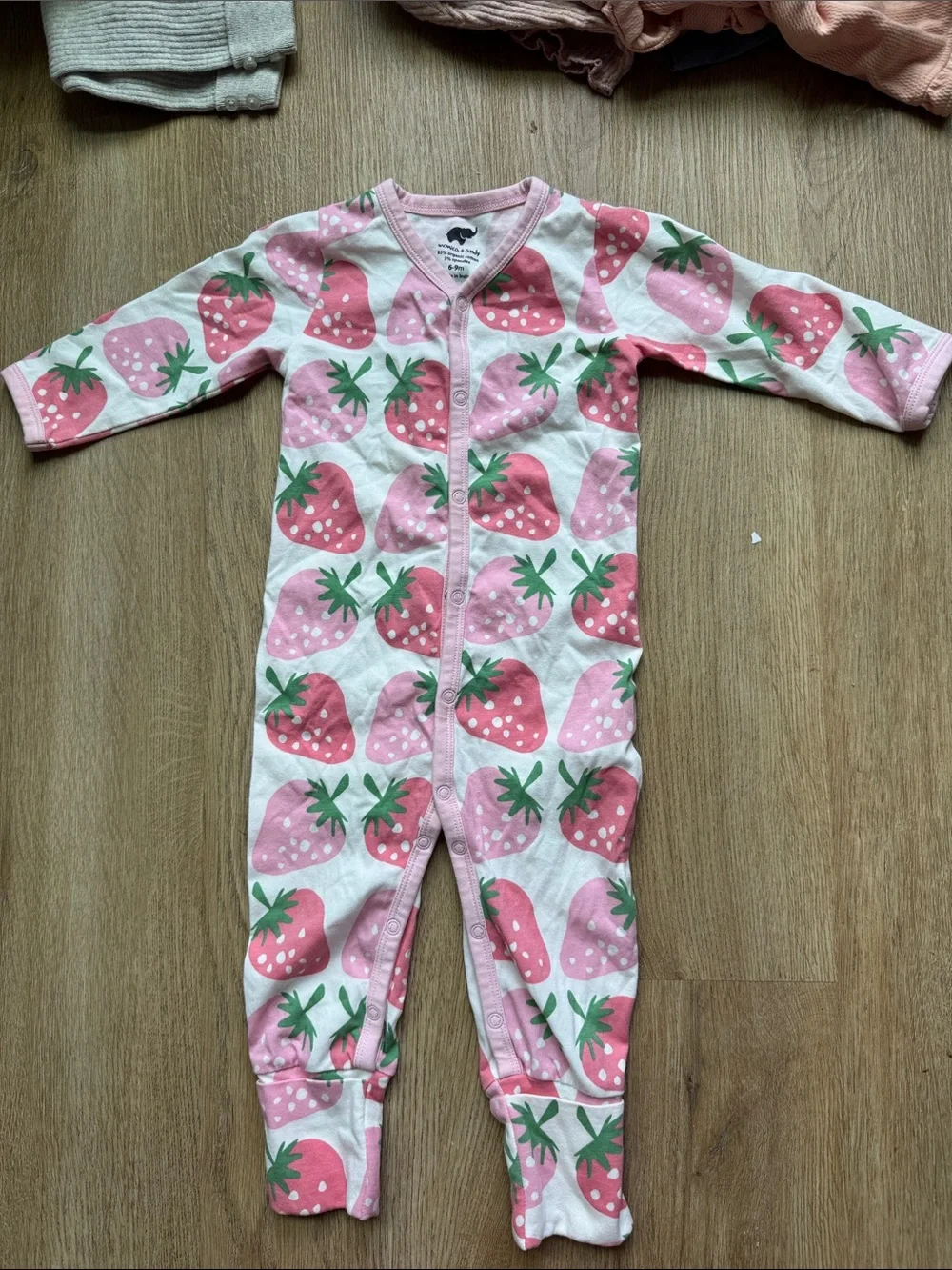 Kids Pink Strawberry Print Footie Romper. 100% organic cotton.
